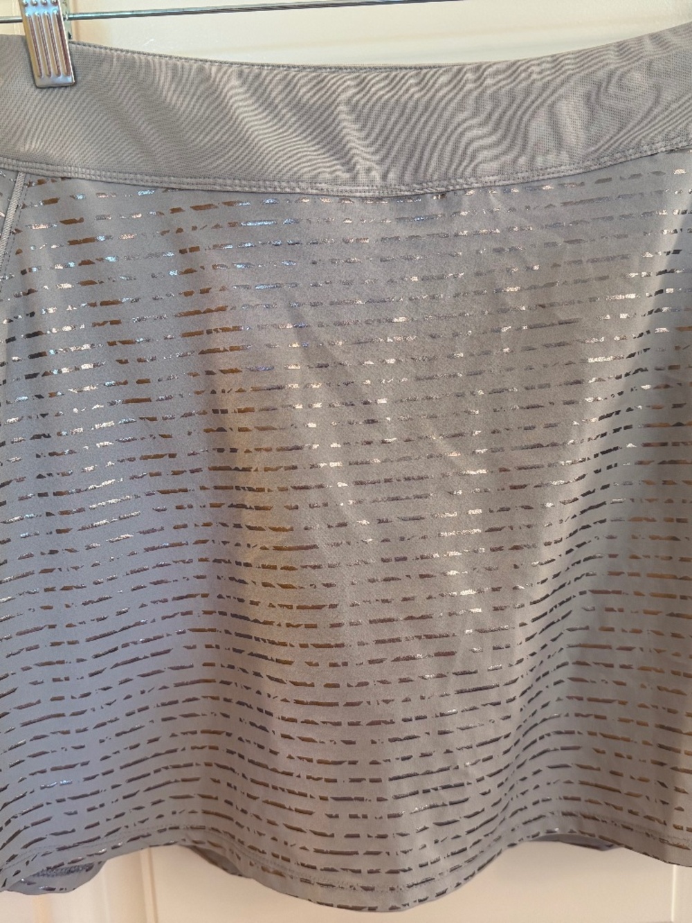 Under Armour light gray and silver skort size L